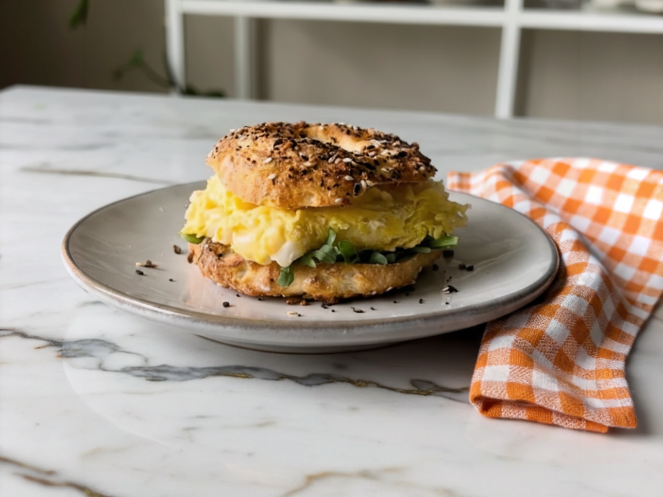 Freshly baked Greek Yogurt Bagels with golden brown crust arranged on a wooden board