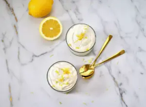 Cottage cheese lemon freezy served in a bowl with fresh lemon slices and mint garnish